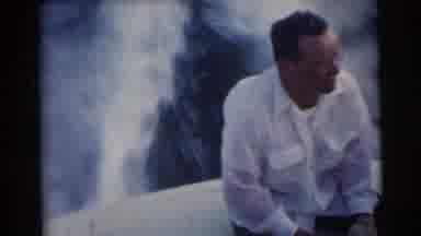 Miami Florida (1956): Two Men Talking On A Medium Speed Boat In A Region With A