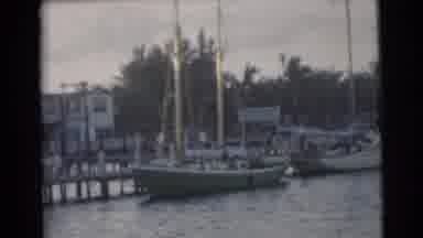 Miami Florida (1956): Driving A Boat Through A Canal In The Late Hours Of The Day