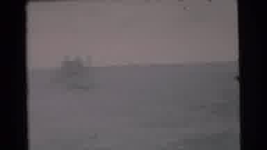 Miami Florida (1956): Men On A Boat Observe The Ocean And Another Boat In The