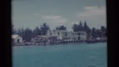 Miami Florida (1956): Houses Along The Shore And Fisherman Taking Their Catch Off