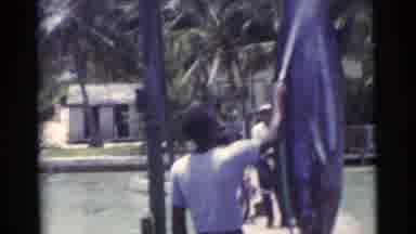 Miami Florida (1956): Man Spraying Water On Captured Large Fish On Water Dock