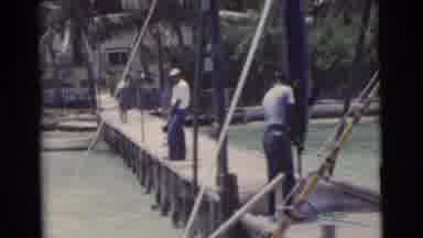Miami Florida (1956): Footage Of A Man Gutting A Swordfish On The Docks Of A