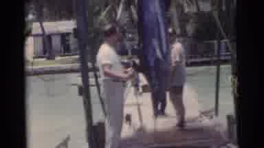 Miami Florida (1956): Man Stands On Boat Dock As Large Dead Fish With Pointy Nose