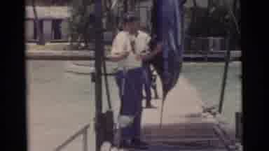 Miami Florida (1956): Two Men On A Dock Talk And Prepare To Fish And Sail