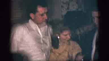 New York City (1956): Man,Woman And Possibly Their Teenage Son Talking And