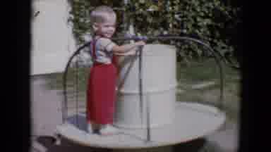 Tucson Arizona USA (1958): Child Playing On Playground Equipment
