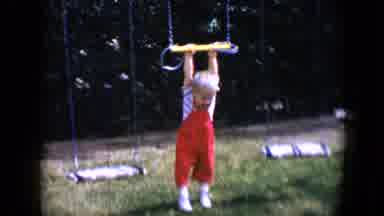 Tucson Arizona USA (1958): Happy Toddler Boy In Red Overalls Swinging Then Running