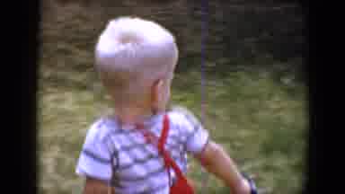 Tucson Arizona USA (1958): Boy In Red Pants Pulling Wagon