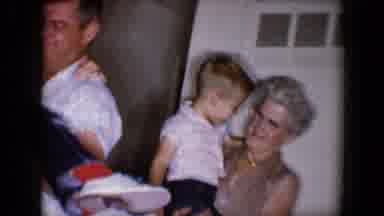 Tucson Arizona USA (1958): Dad And Grandmother Hold Children As Grandmother Tugs