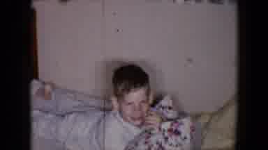 Tucson Arizona USA (1958): A Boy Lies On His Bed Looking Up At The Camera Before
