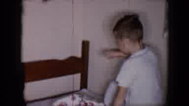 Tucson Arizona USA (1958): Kid Is Jumping On The Mattress With Smiles On His Face
