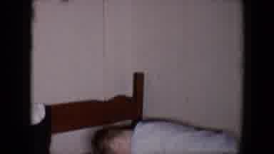 Tucson Arizona USA (1958): Little Boy In Pajamas Jumping Onto Twin Bed With A