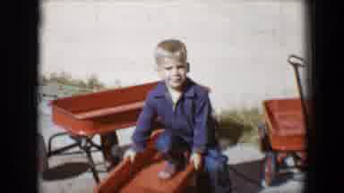 Tucson Arizona USA (1958): Little Boy In A Red Wagon And A Car With His Friends