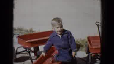 Tucson Arizona USA (1958): Two Little Boys Getting Into A Small Car That They're