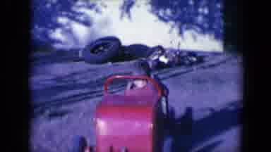 Tucson Arizona USA (1958): Boy Riding A Red Toy Car In The Playground