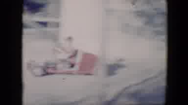 Tucson Arizona USA (1958): Little Girl Sits On Swings As Little Boy Runs Off To