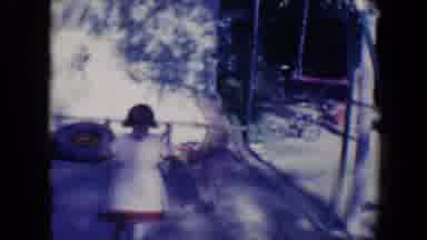 Tucson Arizona USA (1958): Little Girl Plays On The Swings As A Little Boy Joins