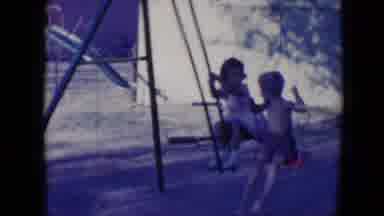 Tucson Arizona USA (1958): Two Children Having Fun On A Swing