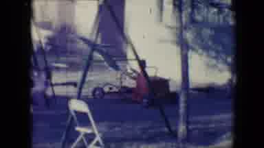 Tucson Arizona USA (1958): A Little Boy Drives Red Go Kart Around The Garden