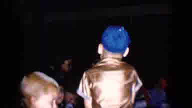 Tucson Arizona USA (1958): Kids In Room Holding Folders Turning Around And Moving