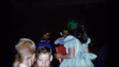 Tucson Arizona USA (1958): Girl Wearing Green Dress Stands Up,Green Hat Falls Off