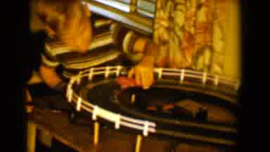 Tucson Arizona USA (1958): Two Boys Play With Electric Track Car But One Track