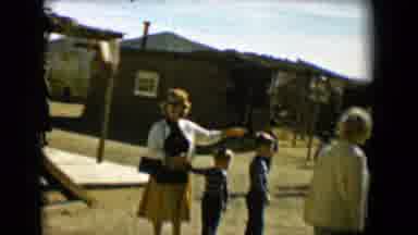 Tucson Arizona USA (1958): Woman Walking With Some Small Children On A Sunny Day