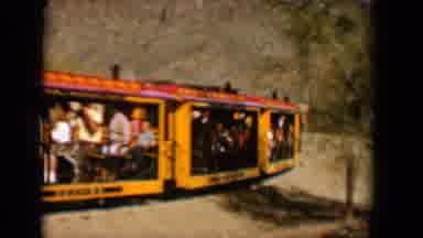 Tucson Arizona USA (1958): An Orange And Red Train Filled With Families Moves