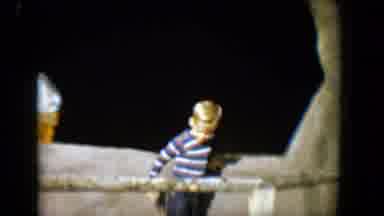 Tucson Arizona USA (1958): Boy Jumps Around As Camera Pans Up To The Sign That
