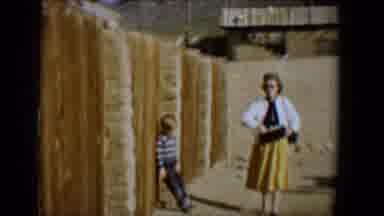 Tucson Arizona USA (1958): Woman Is Waking Outside Along With Her A Child Who Is