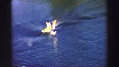 Lake Tahoe California-1969: Dolphin Tows Person On Yellow Board Around Buoy On A