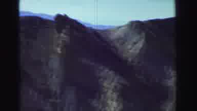 Lake Tahoe California (1969): Aerial View Of A Mountain And People Walking Near A