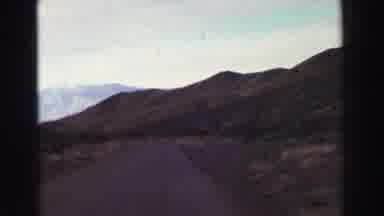Lake Tahoe California (1969): Scenic View Of Mountains In The Distance Filmed From