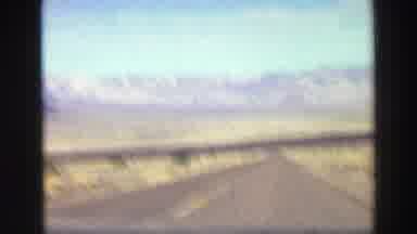 Lake Tahoe California (1969): On A Road Through The Desert, Looking Towards A