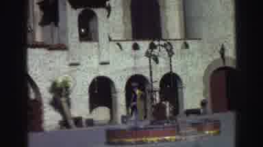 Lake Tahoe California (1969): Man Walks Around The Front Of A Large Building With