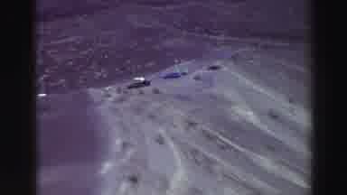 Lake Tahoe California (1969): A Remote Shot Of Cars Parked In A Canyon Area