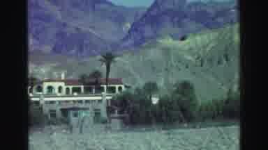 Lake Tahoe California (1969): Passing View Of Green Trees And White Homes On A