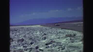 Lake Tahoe California (1969): People Walking Outside Around An Area With Rocks In