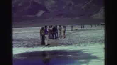 Lake Tahoe California (1969): People In A Valley With Snow Melting At The Foot Of