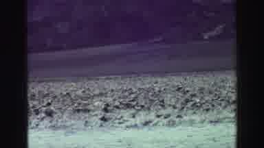 Lake Tahoe California (1969): Scenic View Of Mountains In The Distance Filmed From