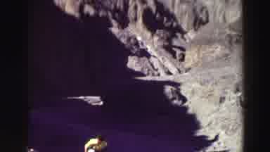 Lake Tahoe California (1969): Person In Yellow Sitting On A Rock New The Water
