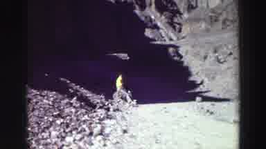 Lake Tahoe California (1969): Two Friends Sitting And Standing On A Rocky Mountain