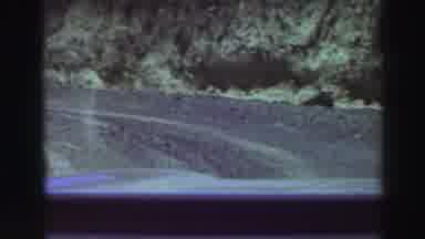 Lake Tahoe California (1969): Car Walking On The Dirt Road Near The Mountains At