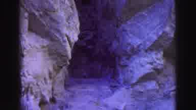 Lake Tahoe California (1969): A Trail Of Caves And Rocks As You Look Up A Mountain