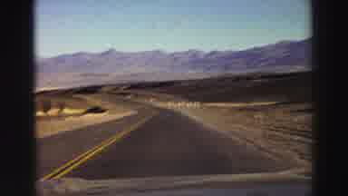 Lake Tahoe California (1969): Scenic View Of Mountains In The Distance Filmed From
