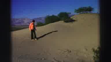Lake Tahoe California (1969): Woman Wearing Peach Colored Blouse Carefully Walks