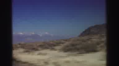 Lake Tahoe California (1969): High Speed Vehicle Riding By The Mountains With A