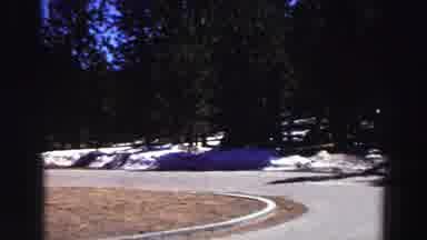 Lake Tahoe California (1969): View Of Green Trees And Melting Snow On A Bright