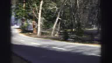 Lake Tahoe California (1969): Car Drives Through The Woods On Crisp Autumn Morning