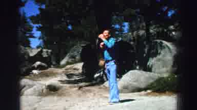 Lake Tahoe California (1969): Man Is Drinking Juice In The Middle Of The Woods